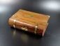 Preview: Holzbox in Form eines Buch mit eingebautem Schloss und Messingapplikationen  21 x 13,5 x 6cm