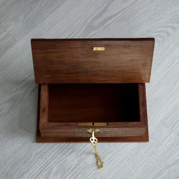 Preview: Holzbox in Form eines Buch mit eingebautem Schloss und Messingapplikationen  21 x 13,5 x 6cm