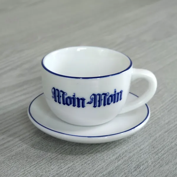 Tee-Söpke Tasse mit Untertasse Aufdruck Moin Moin